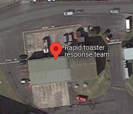 Looking at the Google Earth imagery of RNAS Yeovilton, and I think a disgruntled person has been a little rude about the fire station on site...