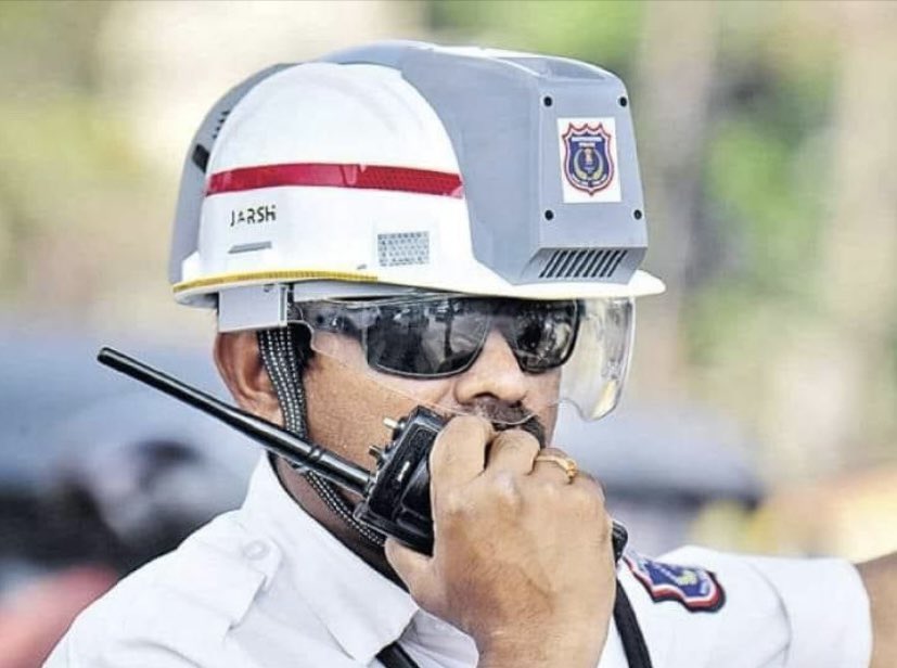 AC Helmet for traffic cop in Gujarat . Looks like a good product , providing relief to men on duty in scorching heat . Should be replicated if experiment succeeds.