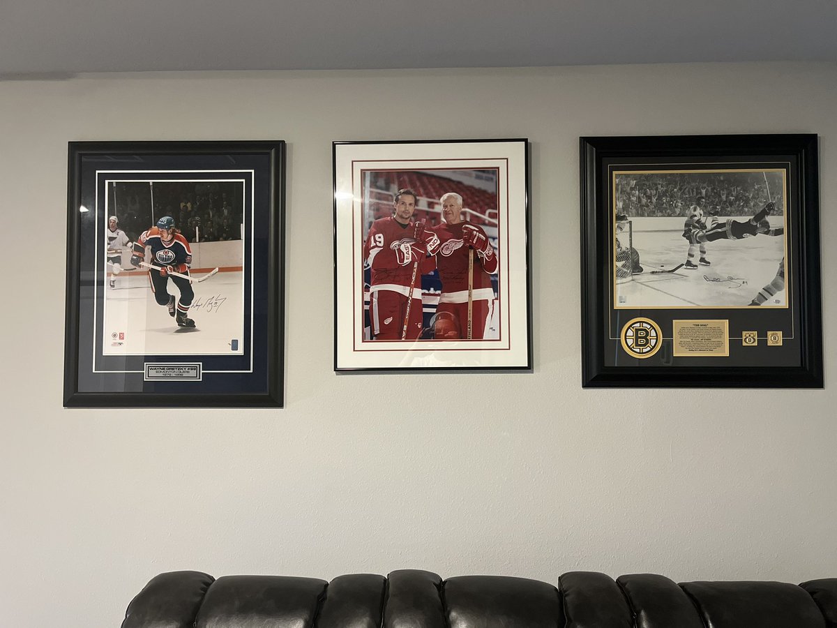 Finally got these signed hockey photos up in our loft. Thinking we now need something Michigan related…