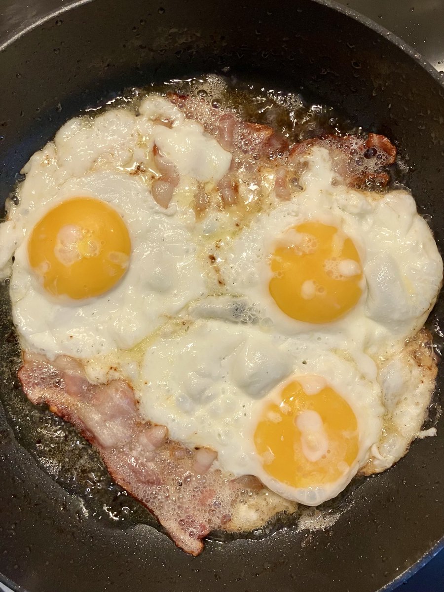 KrisBlackRose's tweet photo. I worked home office today so had a little time to make lunch: #eggs frying in #butter and with some #bacon. I added 2 pickled #pepperonis as with @olyveyaa we like #pickles. 😌 https://t.co/7GFoEIBcyM