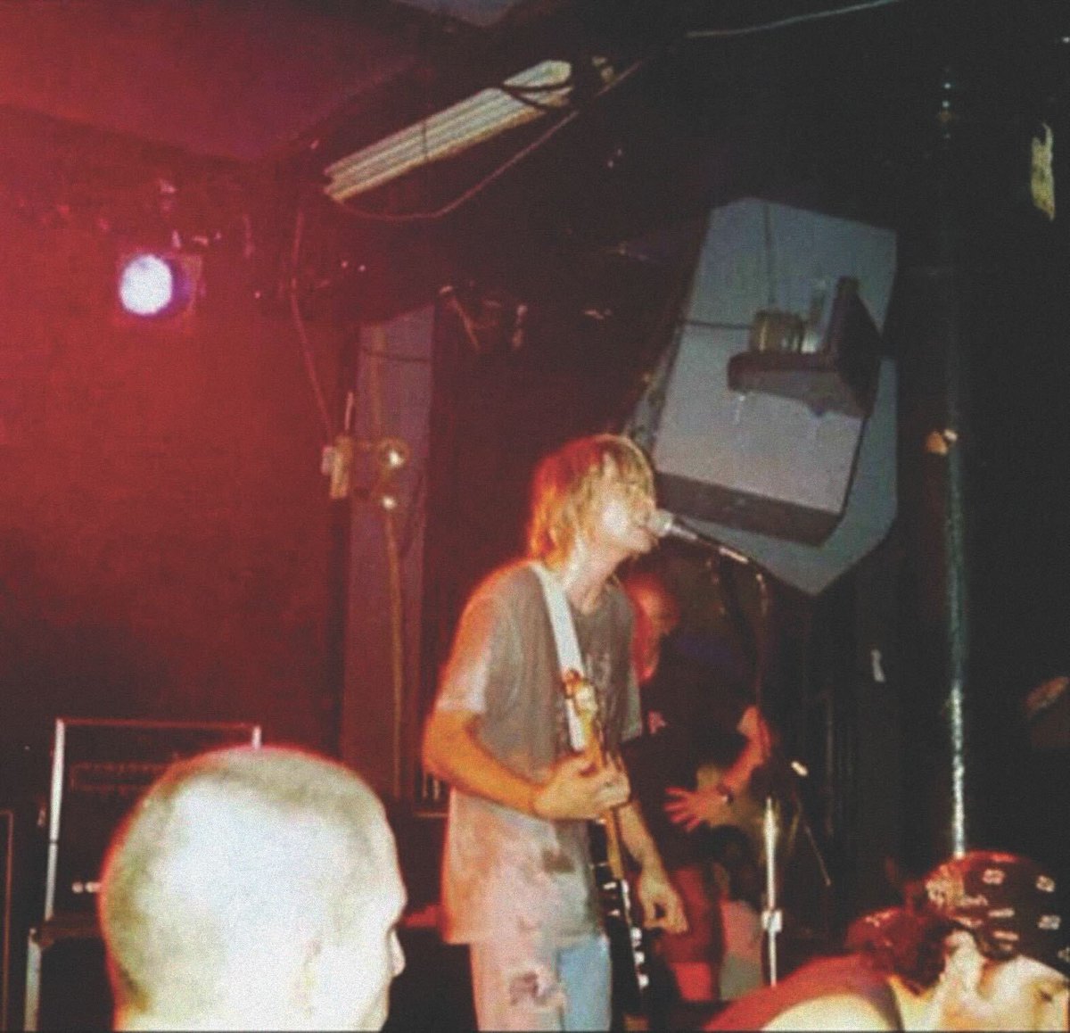 930Club's tweet photo. 33 years ago, the 9:30 Club reached Nirvana when the band took the stage on October 2, 1991. 

Today marks three decades since Kurt Cobain left us with his legacy, his music, and a heart-shaped box-sized hole in our chests. https://t.co/9e9VJ99SkH