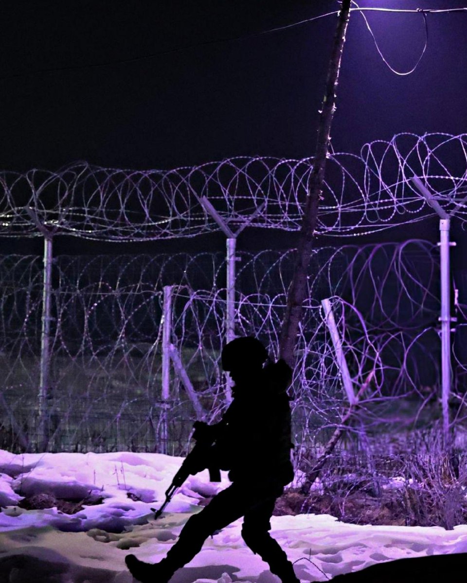 Army trooper guarding the LOC next to the AIOS, anti Infiltration obstacle system.

Somewhere in Uri sector!