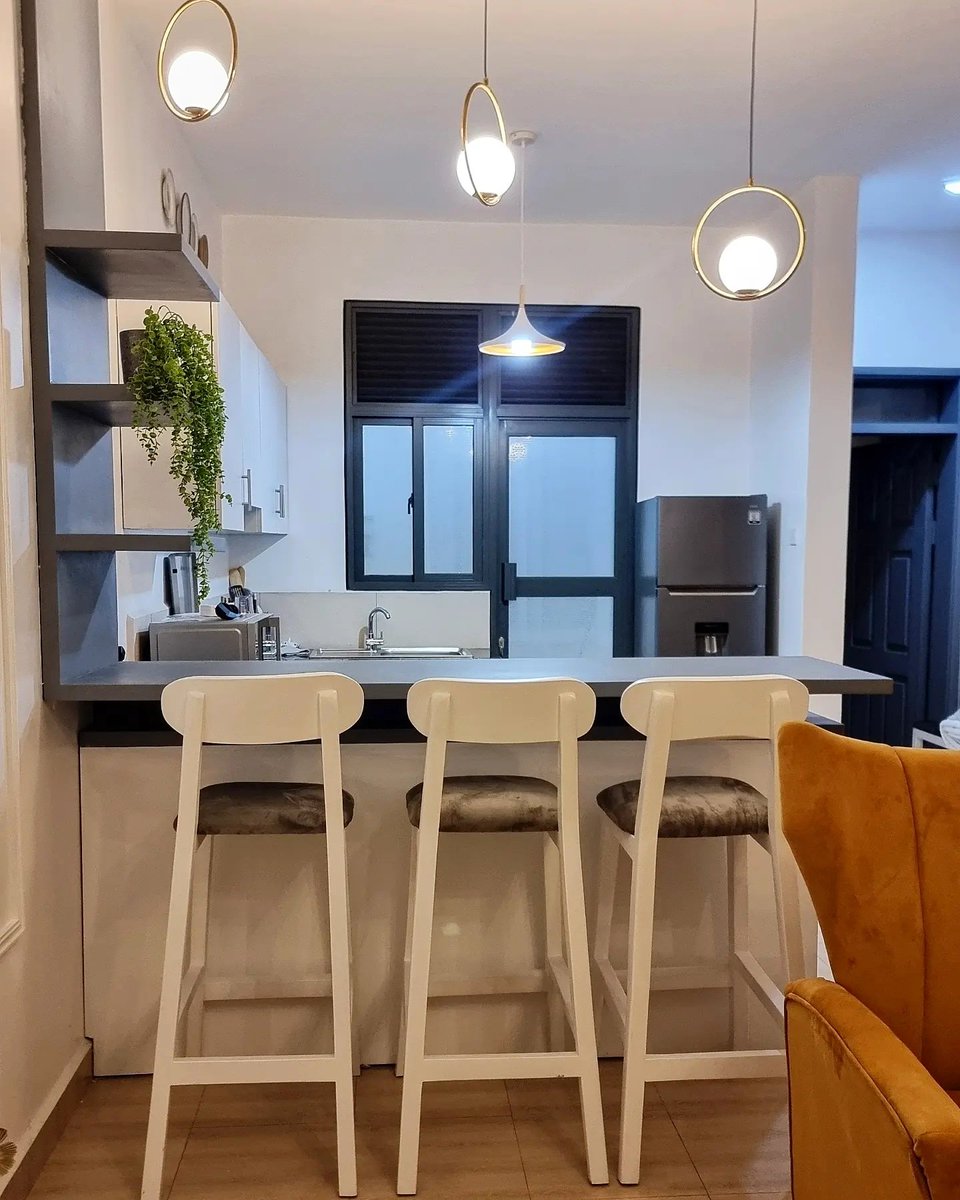 TBH this is our favorite shot. The lights work so well with rhe kitchen island and the chairs... We loved this project 0772277105