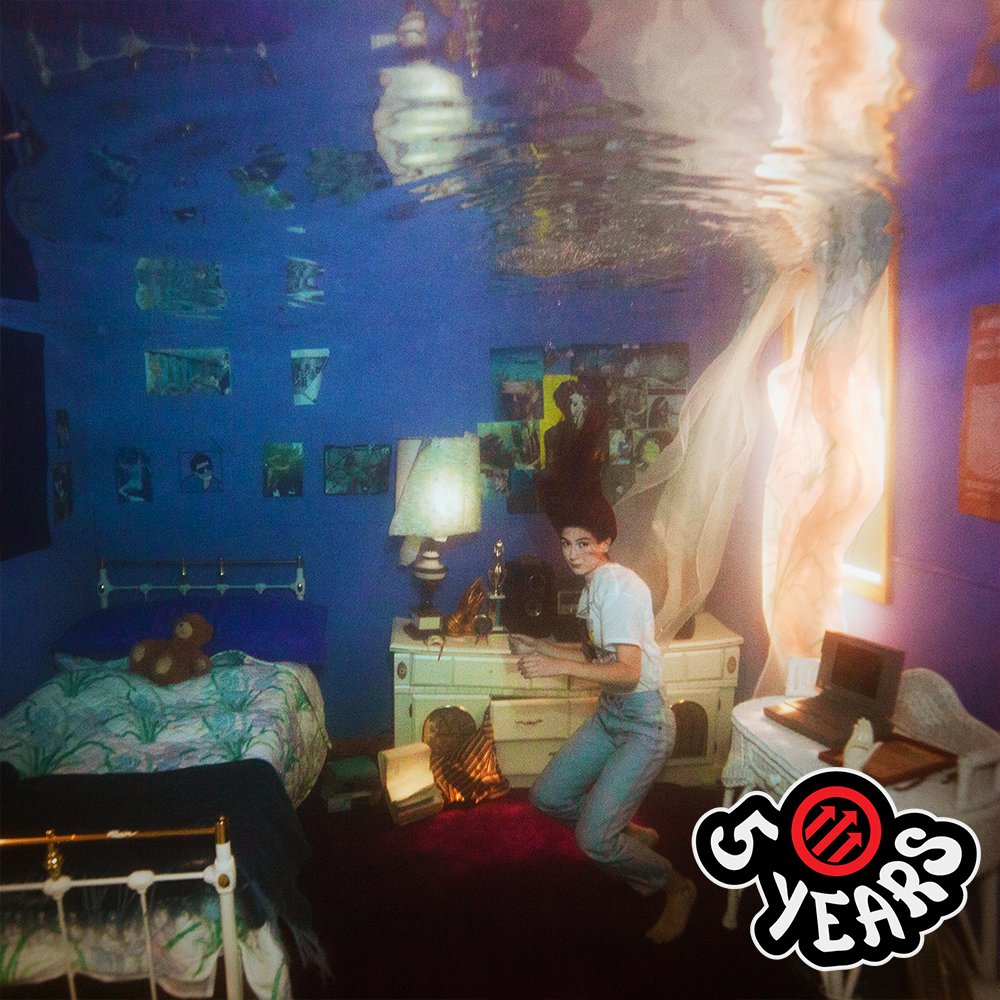 pitchfork's tweet photo. .@WeyesBlood's Titanic Rising turns 5 today. 

Natalie Mering’s fourth album is a grand, sentimental ode to living and loving in the shadow of doom. Revisit our 8.5 Best New Music review 🔗 : https://t.co/mJl8LRffYD https://t.co/7xwYWM0BeJ