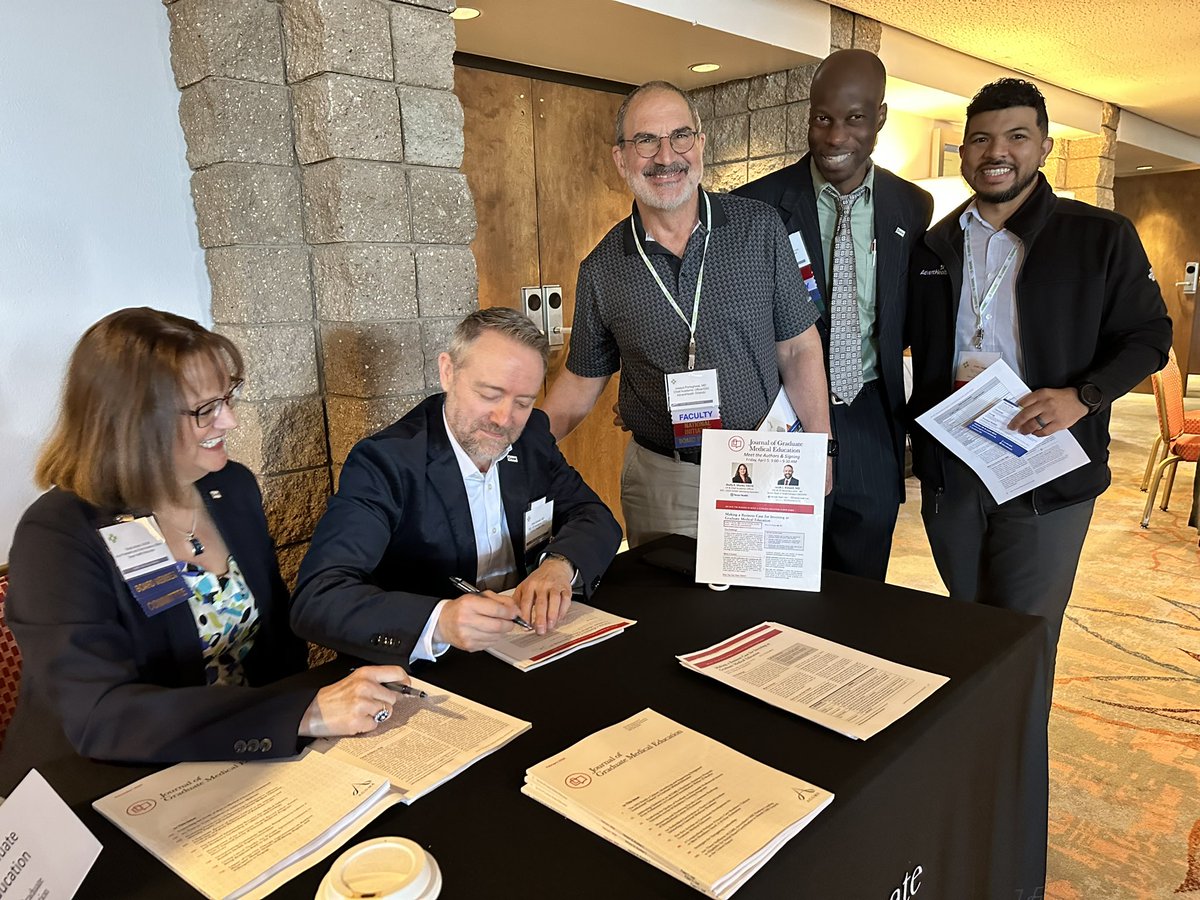 A first - an author signing at @AiAmC_on_Tweet annual Meeting with @shelly_monks and @JakeBidwell hosted by @JournalofGME re business of #GME. So fun for people to actually chat w authors & for authors to be recognized for their hard work!! #MedEd @AdvocateAurora @texashealth