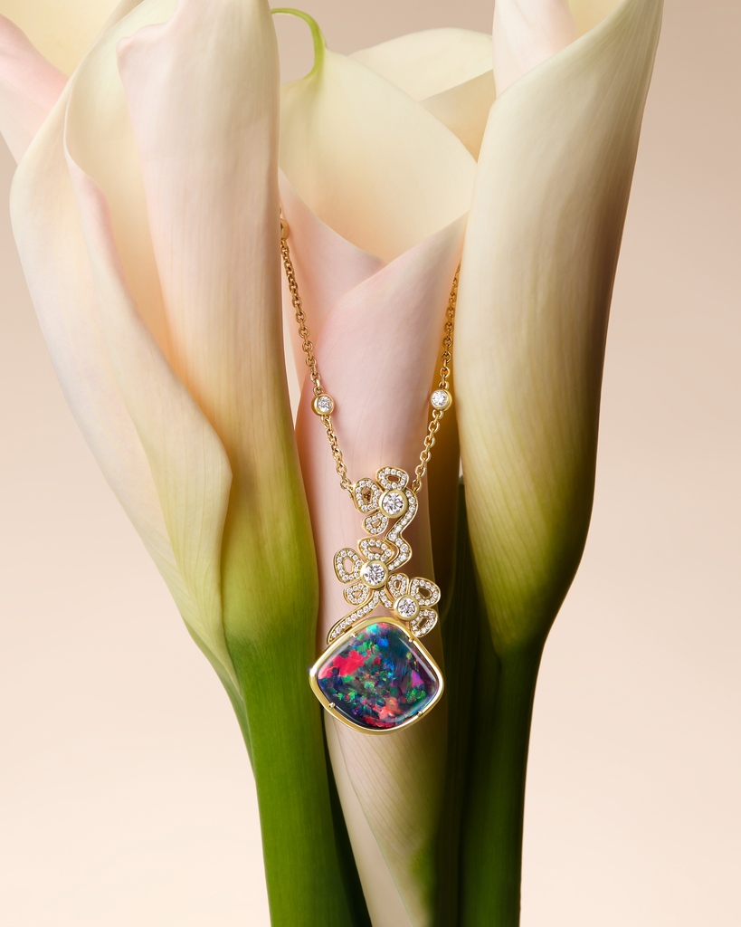 Inspired by the the city of Barcelona’s incredible architecture, a black opal sits at the heart of this 'Barcelona' pendant with shining florals climbing up gold trellises. ⁠ #Boodles #AFamilyJourney #Barcelona⁠