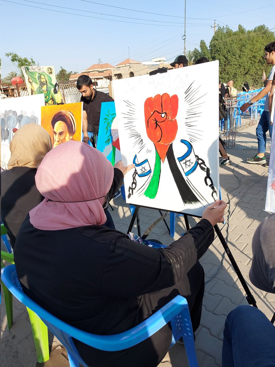 بالصور جانب من فعاليات يوم القدس العالمي في العاصمة بغداد لوحات تجسد صمود من فناني عراقيين #طوفان_الأحرار #يوم_القدس_العالمي #القدس_درب_الشهداء