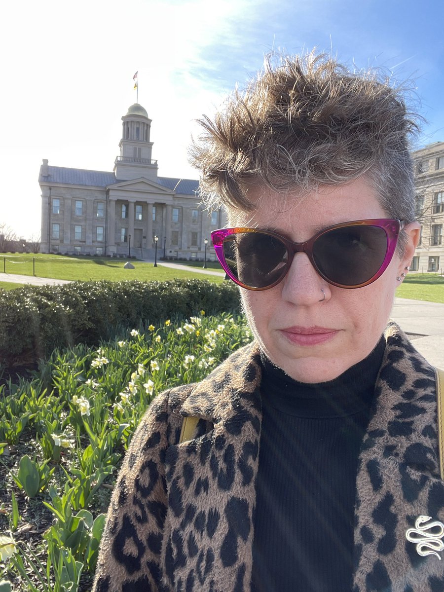 An English major in a black turtleneck never really leaves Iowa City, she just…gets older