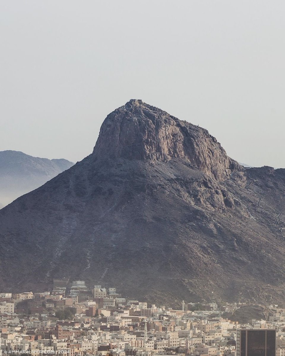 This is Jabal an-Nūr (Mountain of Light), at the peak of the mountain is the Cave of Hira, where the Prophet ﷺ used to spend time and where he received the first revelation of the Qurʾān, by the angel Jibrāʾīl عليه السلام. It is here that the verse 'Iqra bismi rabbik Alladhī