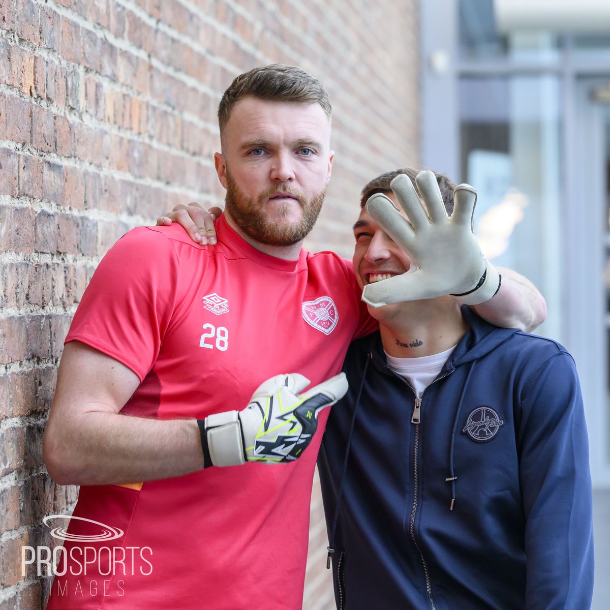hmfcalum's tweet photo. @Zanderr1 doing a great job speaking to the media for @JamTarts, ahead of the @cinchuk @spfl match against St Mirren, but @Kenneth77V manages to photobomb the pics 😂📸 #HeartsFC #Vargas #ZanderClark #HeartofMidlothian #Jambos https://t.co/qTNz8XuQ4c