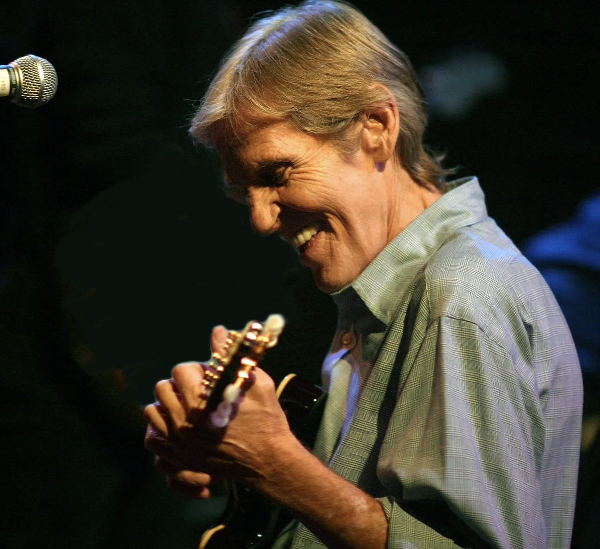 A candid photo of Levon Helm performing with his mandolin during a Midnight Ramble in 2010.