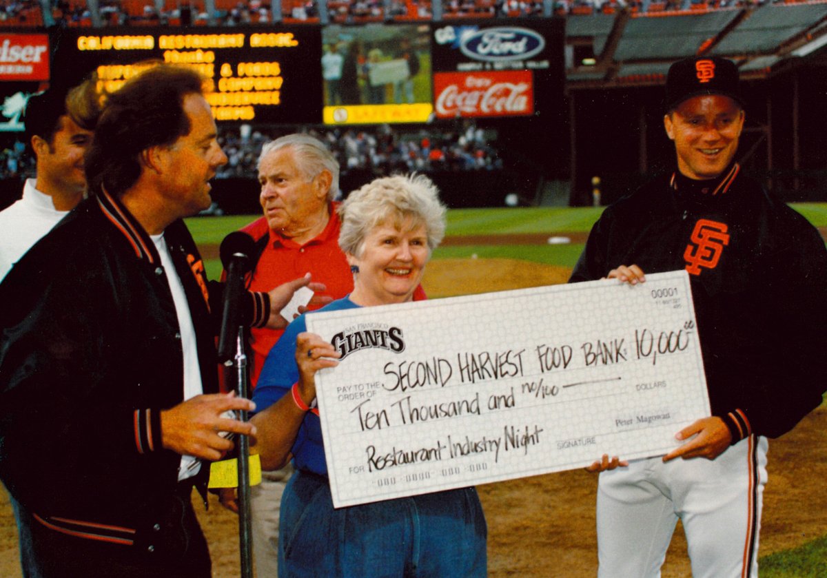 ⚾🧡 @SFGiants' home opener at Oracle Park today! #FlashbackFriday to '93 when Rich Larson of @CalRestaurants & Bill Swift presented Mary Ellen Heising of @2ndharvest with proceeds from Restaurant Industry Night at Candlestick Park. #50YearsofNourishment 🎉