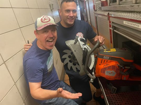 When the fire department in Philly asks you to sign their 'power rescue cutter' saw! Might have to use this in a future film!