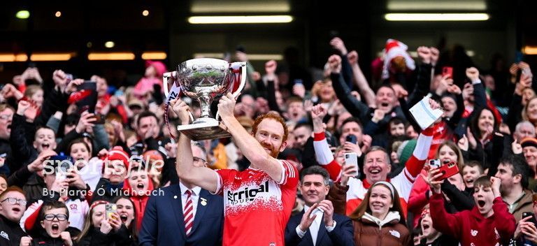 Derry captain Conor Glass lifts the cup after his side's victory over Dublin in the Allianz Football League Division 1 Final at Croke Park last weekend. sportsfile.com/more-images/77…