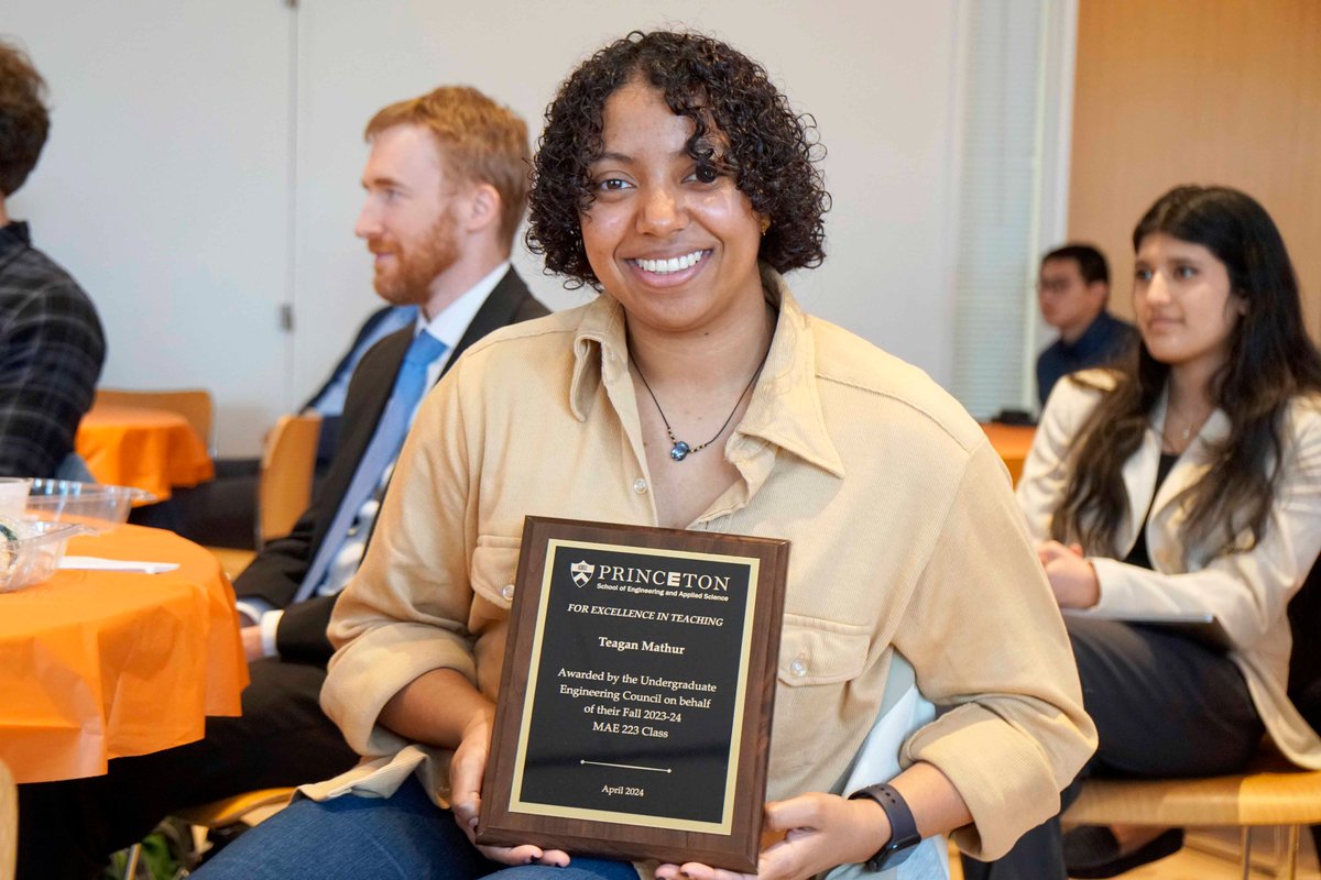 .@TeaganMathur, a graduate student in mechanical and aerospace engineering, poses with the Excellence in Teaching award she just received during the awards ceremony on Friday. All 16 honorees will be listed on our website in the near future.
