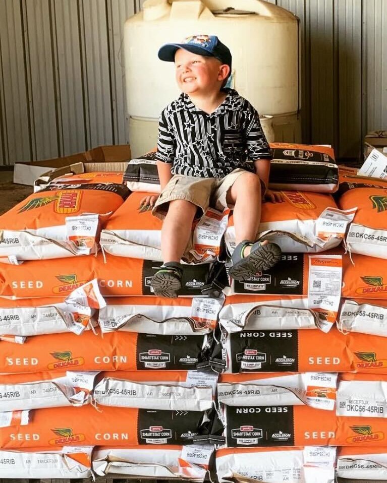 It’s #FarmKidFriday and we hope planting season is making you this happy, too. 🌽 📸: pewqeryspigsandpoultry via IG