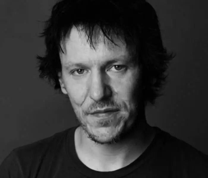 Relaxing and listening to Elliott Smith; while I know this may seem odd, something is soothing about his music.

The combination of the ghostly multi-tracking vocals or the lyrics that offers me solace.

Sometimes, you just need a song that reflects how you feel inside.