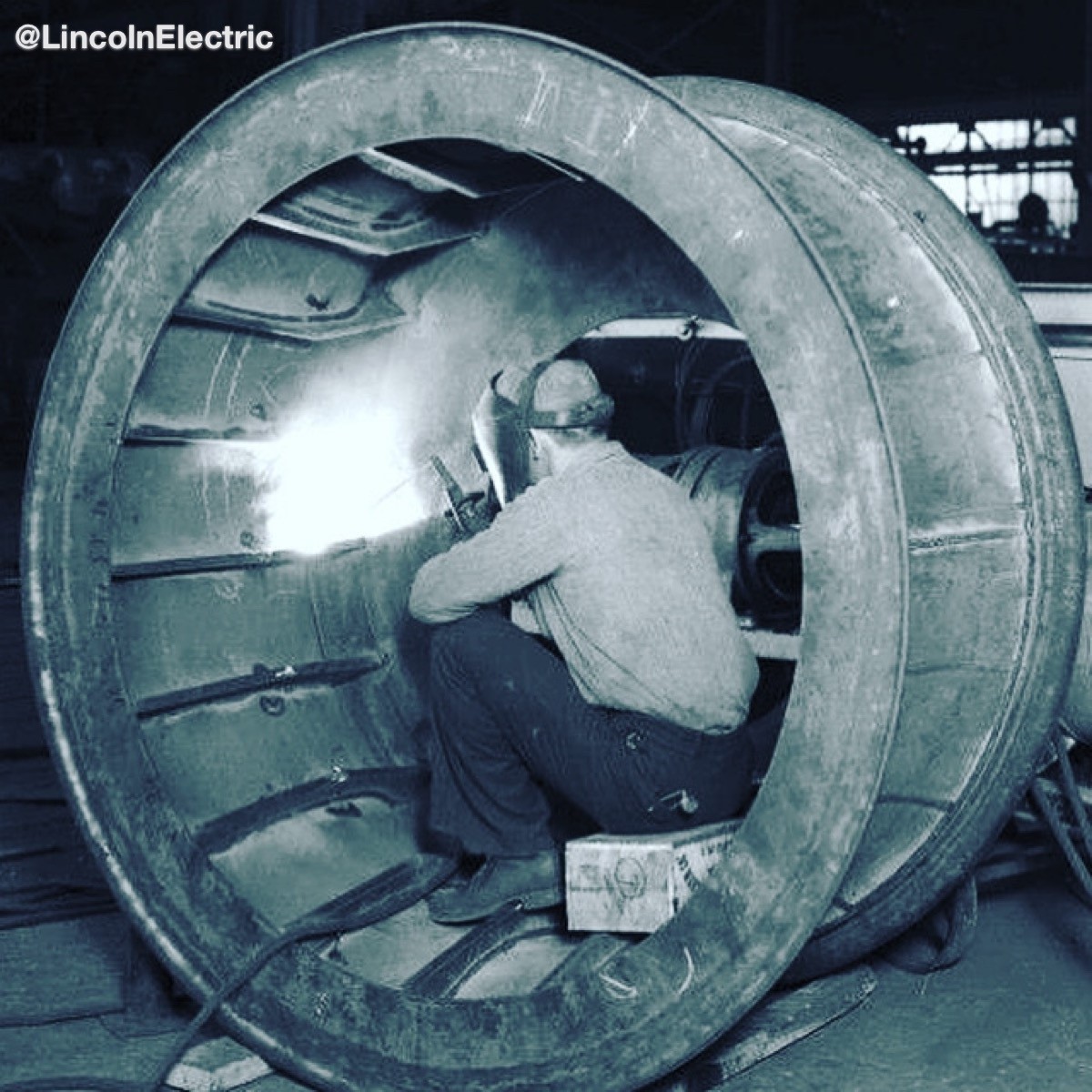 Flashback Friday® - In October 1939, an employee of Lasker Boiler &amp; Engineering Co., Chicago, IL, fabricates one of the 1/2-ton Snow Cruiser wheels for Admiral Richard E. Byrd's Antarctic Expedition II. #FlashbackFriday #WeldRed #WeldRedNation