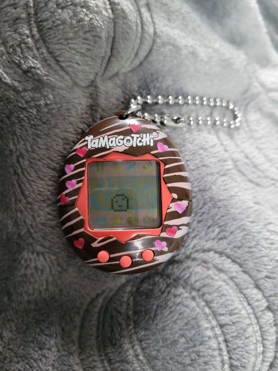 Help!  My little sister thought it would be fun to pull the pin on my tamogatchi and now I have to raise it?!?  Idk what to do!  I'm not ready to be a mother 😭😭😭