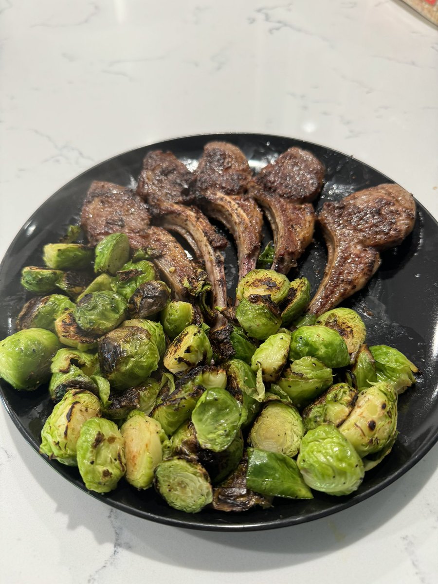 Dinner is served!! 
#Lambchops 
#BrusselSprouts