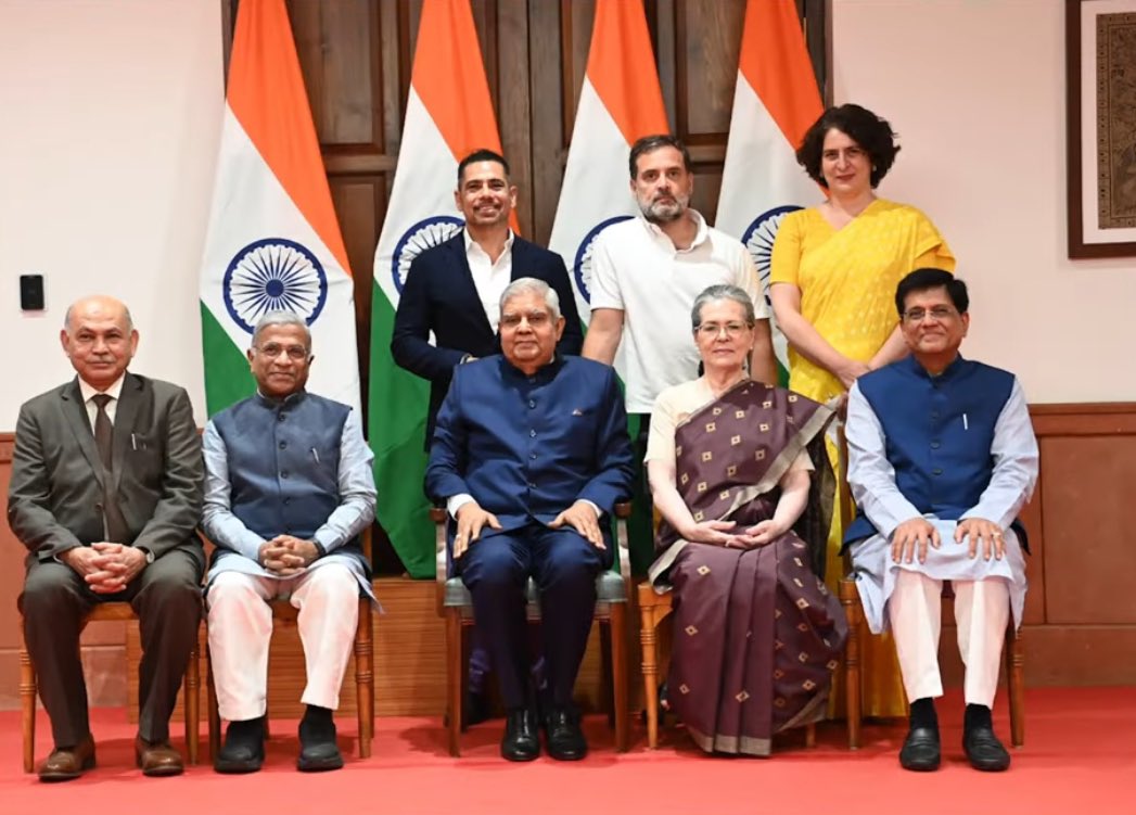 Formal family photo with the Vice President on Sonia Gandhi joining Rajya Sabha Look at the way Rahul Gandhi is standing. What's wrong with this man?