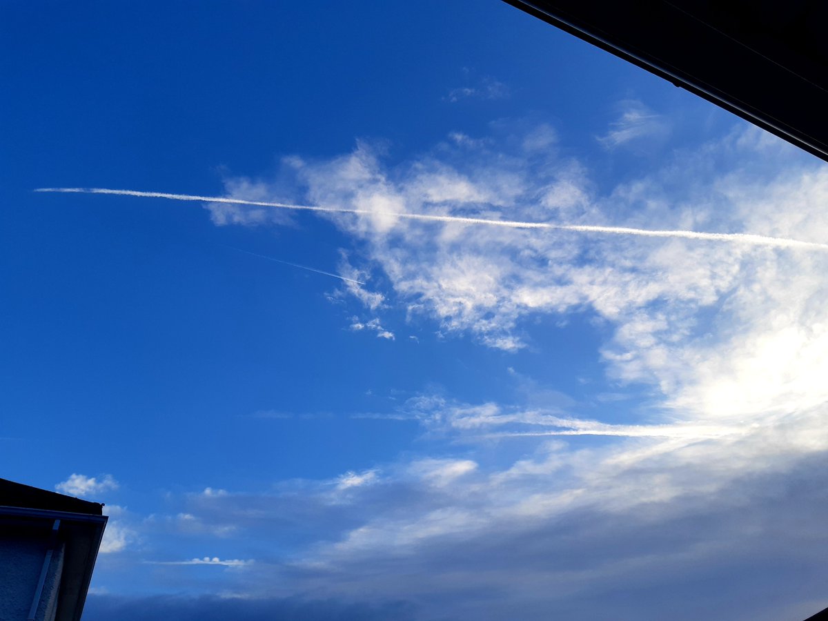 Early morning jet trails, and a sighting of blue sky ahead of the rain and wind. #StormKathleen