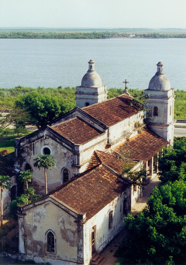 The Church of Our Lady of Liberation, also known as the Old Cathedral, is an 18th-century Roman Catholic church in Quelimane, Mozambique. Built by Portuguese missionaries, it became a national monument in 1943. Plans to restore the abandoned cathedral were set for 2018.