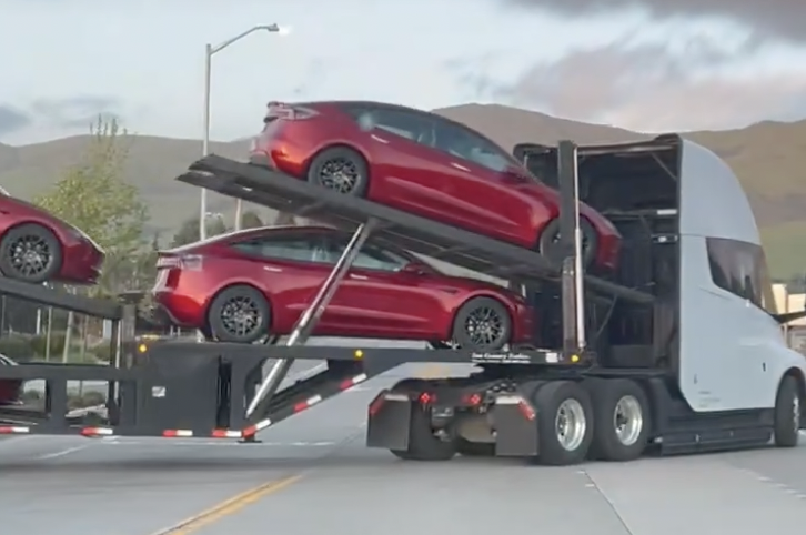 Tesla Semi delivering truck load of new Model 3s from Fremont.