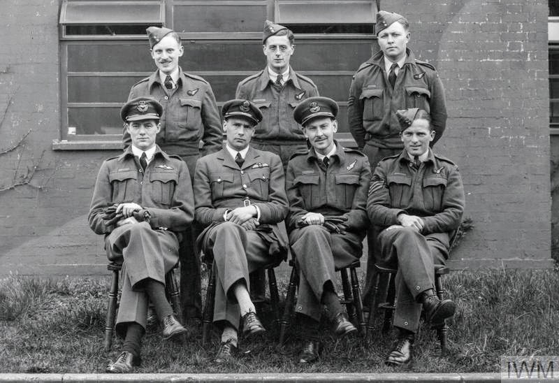 Acting CO of No. 44 Squadron RAF, Squadron Leader J.D. Nettleton (sitting, second from left), and his crew after the attack on the MAN diesel engineering works at Augsburg on 17 April 1942. For his courage and leadership during the raid, Nettleton was awarded the Victoria Cross.