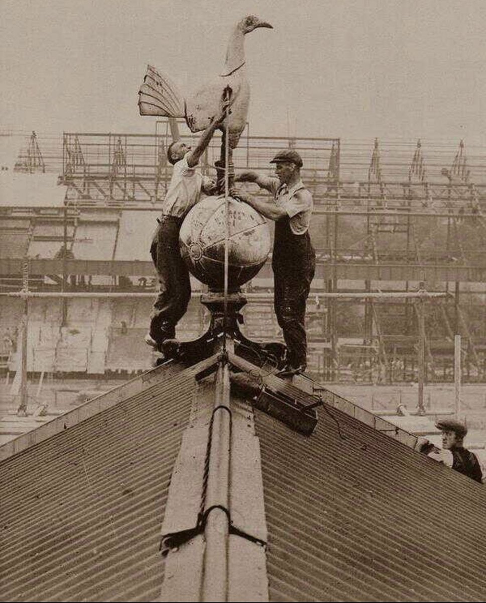 1934 The symbol of our club goes up on the west stand,as the new east stand is being built in the background