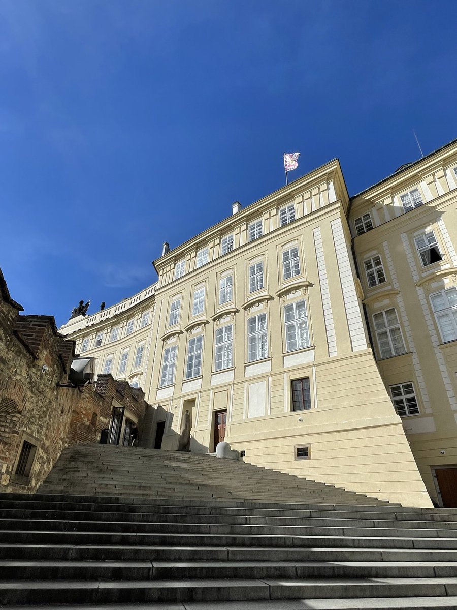 From recent trip to @Prague. The President’s standard flares over the presidential palace at the Prague Castle. Bright day and contrasting light. Geometry. Energy boost, old connections nourished, new connections started. Life goes in circles.