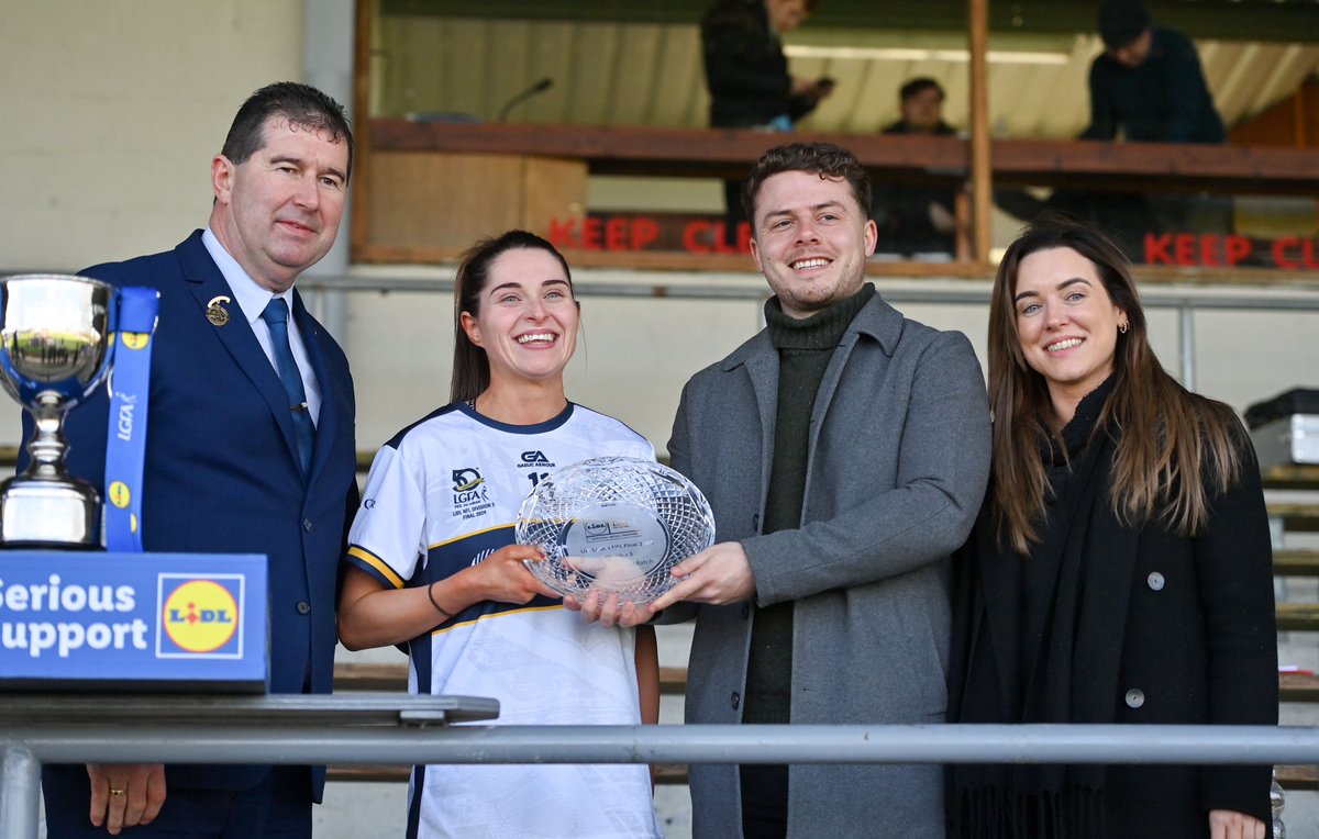 Ladies Football (@ladiesfootball) on Twitter photo What a day for Caoimhe Harvey! 😄
Captain of the <a href="/Clarelgfa/">Clare LGFA</a> team that landed the <a href="/lidl_ireland/">Lidl Ireland</a> NFL Division 3 title and also named as Player of the Match!
Caoimhe is presented with the award by, from left, Uachtarán Cumann Peil Gael na mBan, Mícheál Naughton, Jamie O’Rourke, What a day for Caoimhe Harvey! 😄
Captain of the <a href="/Clarelgfa/">Clare LGFA</a> team that landed the <a href="/lidl_ireland/">Lidl Ireland</a> NFL Division 3 title and also named as Player of the Match!
Caoimhe is presented with the award by, from left, Uachtarán Cumann Peil Gael na mBan, Mícheál Naughton, Jamie O’Rourke,