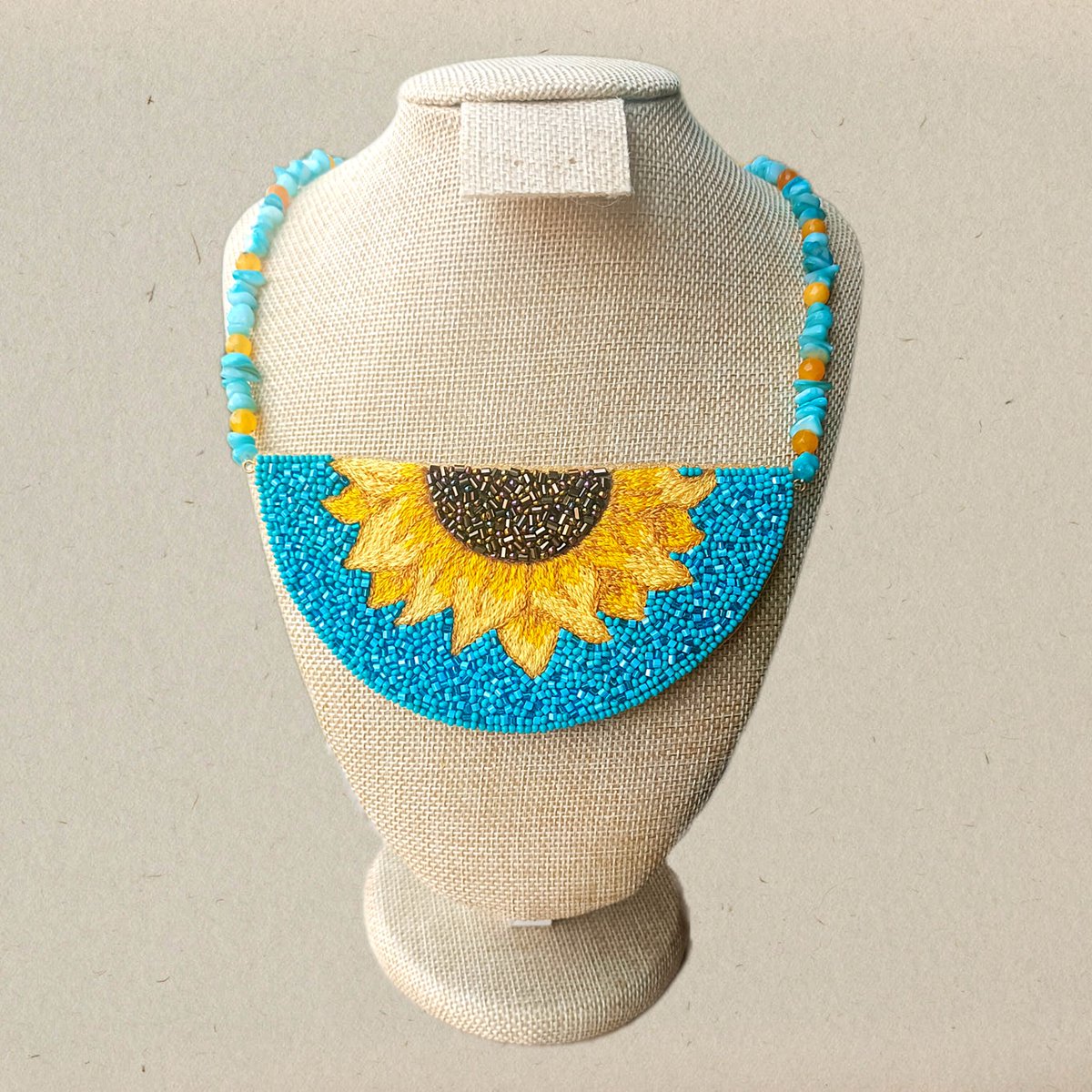 Sunflower necklace 🩵🌻

#handembroidery #mywork