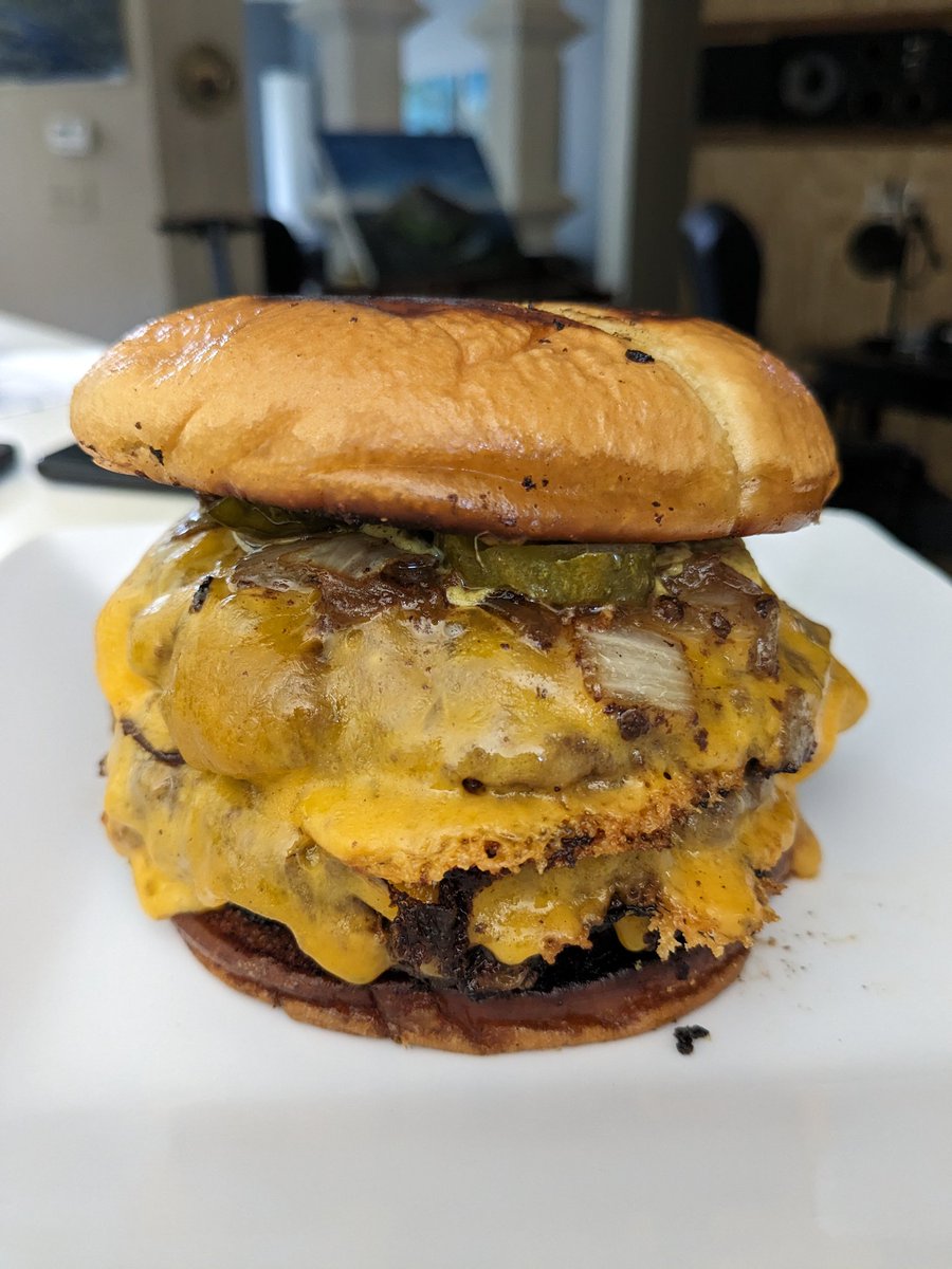 E. Smitty triple cheddar smash burger: Keto Bun 2/3 lbs grass fed beef Caramelized Onion Organic cheddar Pickles Spicy brown mustard Cage free Mayonnaise Yummy 😋🤤😁😉