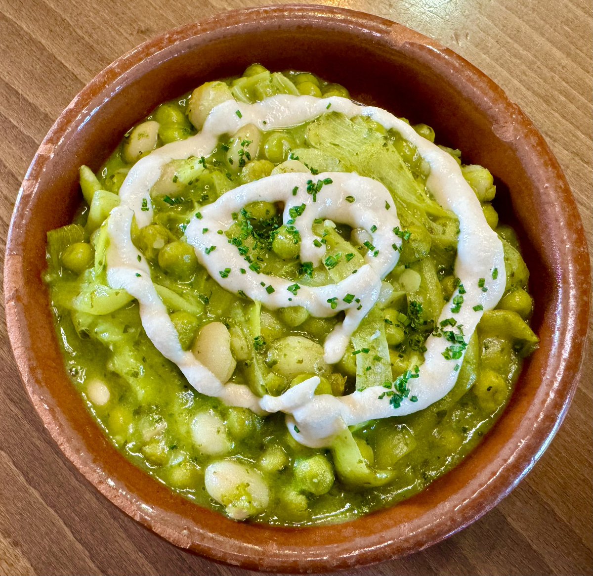 New dish on our new summer menu. Creamy Navarran alubias beans with peas, spinach baby and basil with vegan cream cheese topped with a roasted Catalan almond emulsion. It’s out of this world and vegan