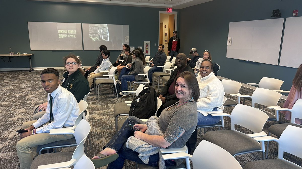 Some students and parents getting ready to show their design and pitch <a href="/FridayInstitute/">Friday Institute</a>