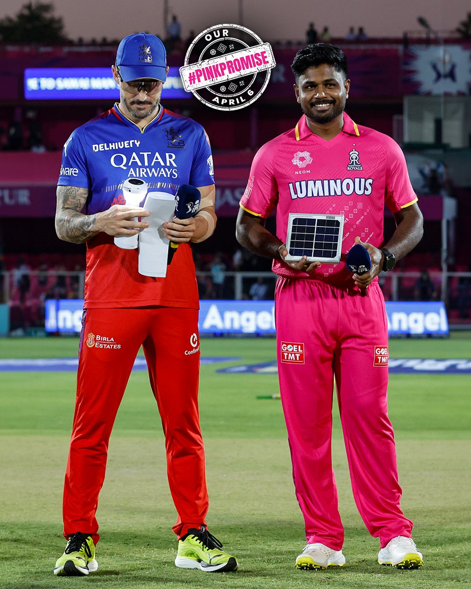 Sanju, Faf and a solar lamp, marking our #PinkPromise to power many homes tonight. 👊💗