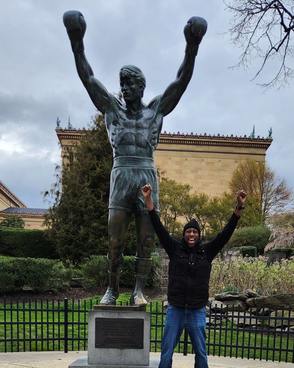 djslimer205's tweet photo. Living it up in the City of Brotherly Love and couldn't miss the chance to pose with the legend himself, Rocky Balboa! Feeling inspired!  #RockySteps #UnderdogStory #DaBoogiemanHimself #DJSlimer #Philly #CityOfBrotherlyLove #Rocky #Creed #fyp https://t.co/vEaJe2yyJo
