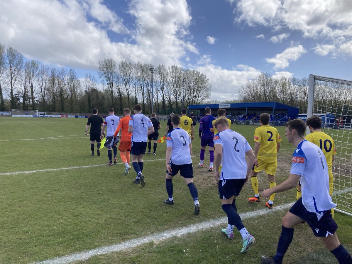 Out come the teams for Vauxhall v Trafford. Kick off is moments away…..