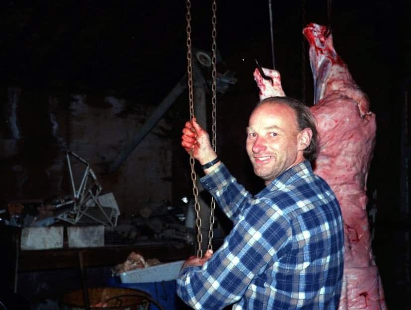 Canada's most prolific serial killer, Robert Pickton (49 killed) photographed smiling in the slaughterhouse of the pig farm where he butchered his victims and later fed them to unsuspecting friends.