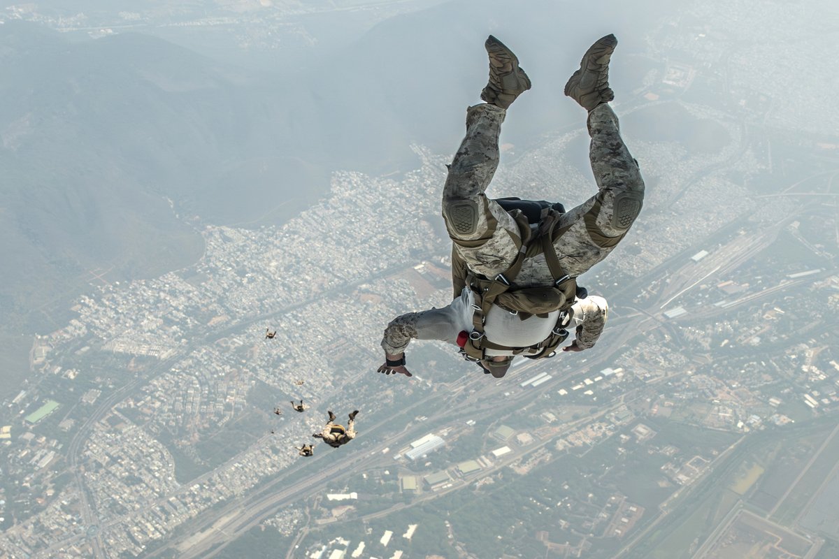 As Marines, we utilize our training and tactical mindset to help us execute missions and win battles. Reconnaissance Marines free fall jump during Exercise Tiger TRIUMPH in Visakhapatnam, India.