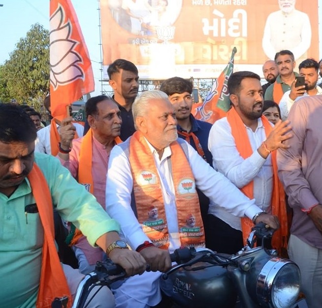 BJP holds bike rally in Rajkot; Rupala, Rupani ride a Bullet