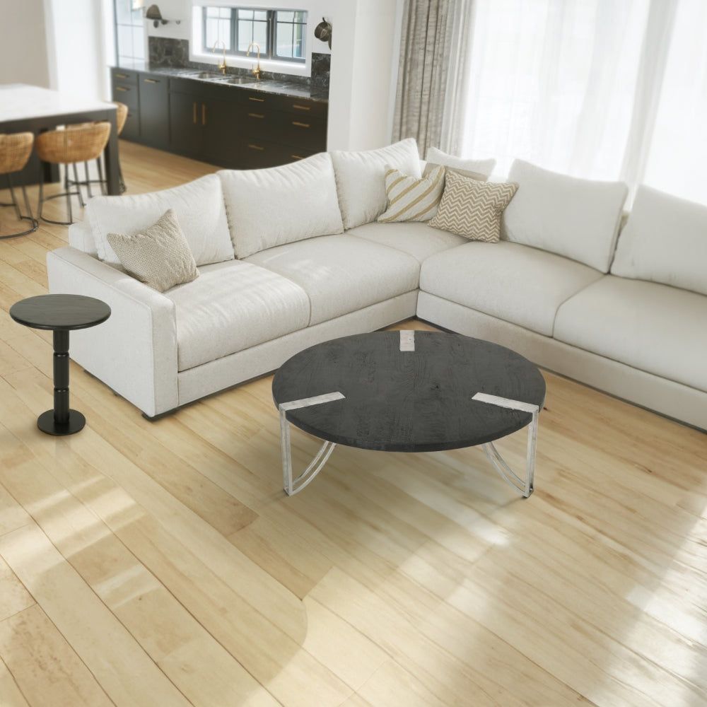 A stylish addition to your living room, the '''coffee table''' is perfect for entertaining guests or simply relaxing with a cup of coffee. . Shop Now👉 buff.ly/3vxi51o . . #homedecor #furniture #interiordesign #livingroom #coffeetable