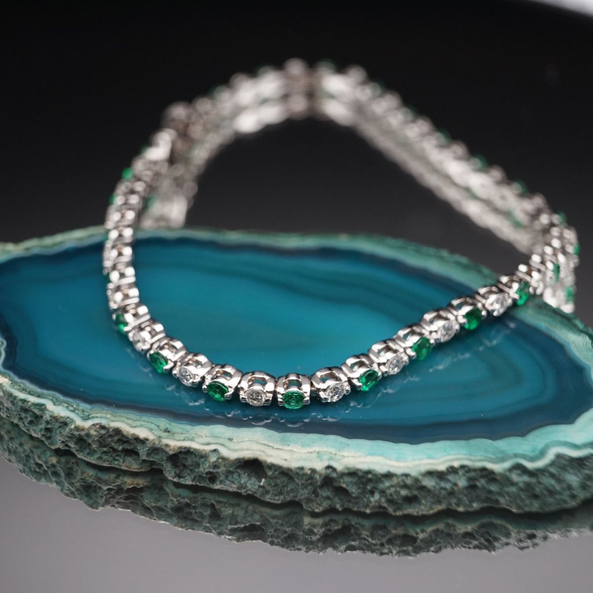 Discover the elegance of Art Gold Jewelry's 14k White Gold Tennis Bracelet, adorned with diamonds and emeralds. A timeless piece that blends luxury with sporty charm. #TennisBracelet #ArtGoldJewelry