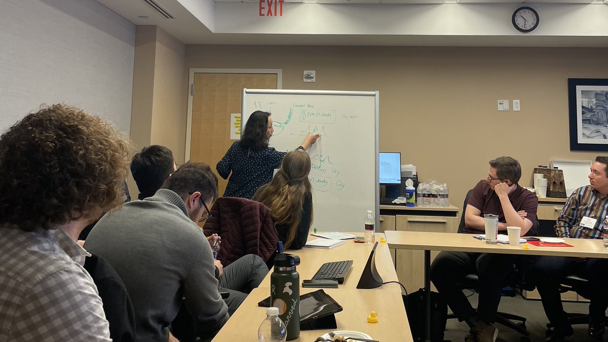 Pulling out the whiteboard at our @PennMedPhys Proton Therapy Workshop for #MedPhys Residents today! My coresident, Lin Ma, PhD, gets interactive on his Intro to PBS Commissioning session with discussant & residency program co-director Jennifer Zou, PhD 🤩