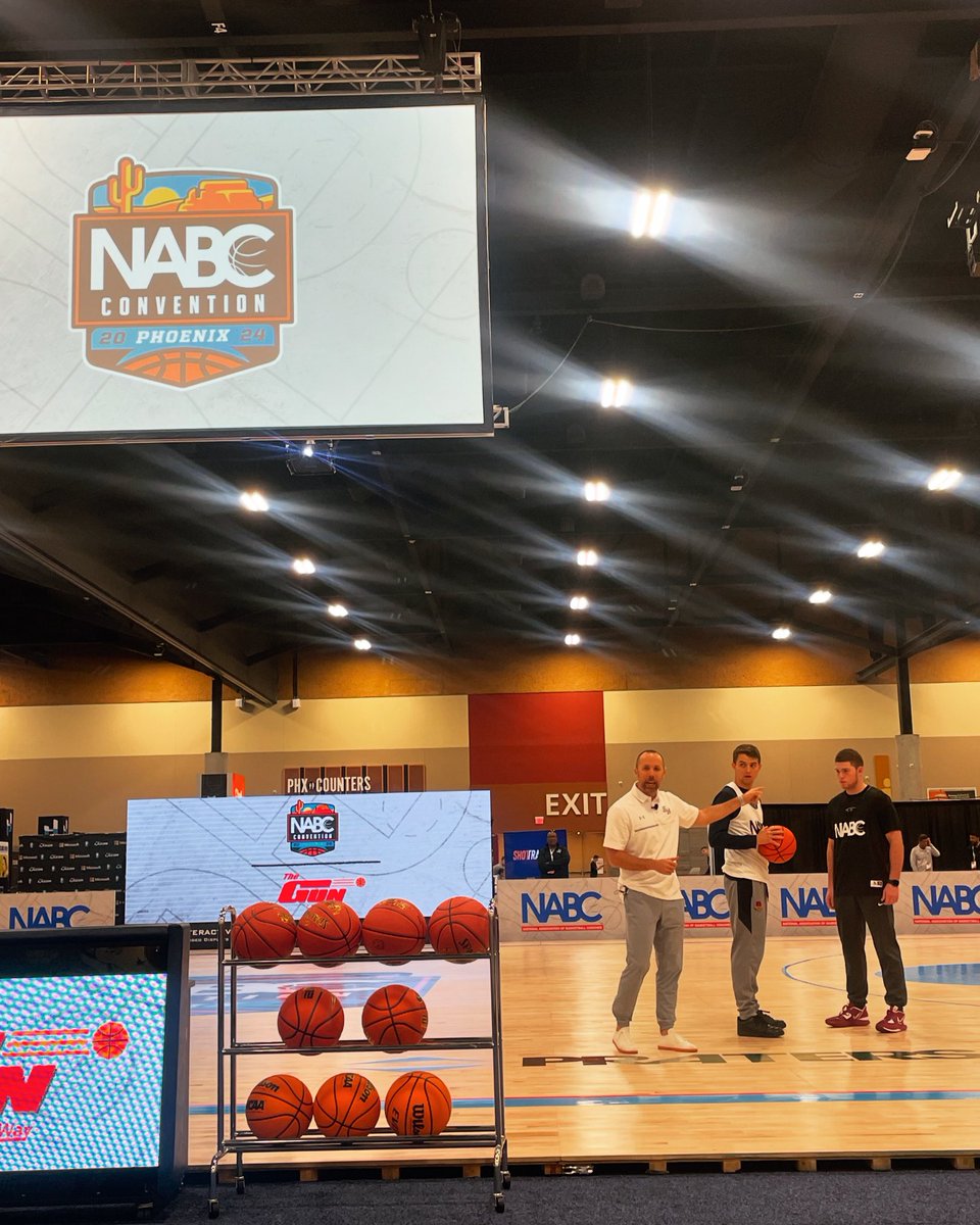 Our HC @chrismudge live at @nabc1927 2024 Final Four Phoenix Convention teaching 4 out 1 in motion. #eatemupkats