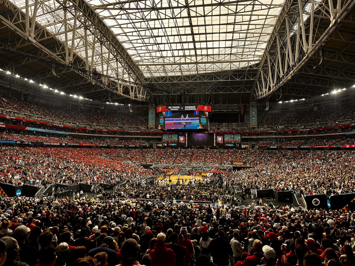 Basketball in a football stadium.