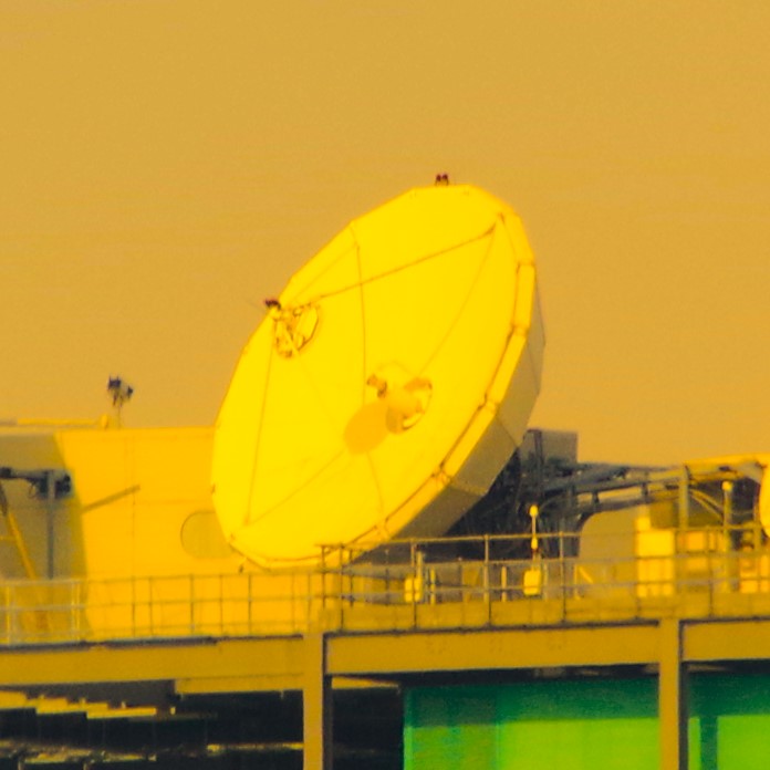 rooftop antenna
singing telemetry to
lonely satellites
