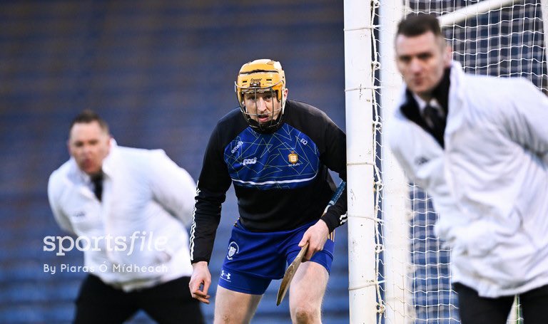 Keeping watch! Clare goalkeeper Eibhear Quilligan and the two umpires, Kieran O’Callaghan, left, and Danny Frewen of the Ballylanders GAA club in Limerick, watch developments during the Allianz Hurling League Division 1 final match between Clare and Kilkenny 📸 @PiarasPOM