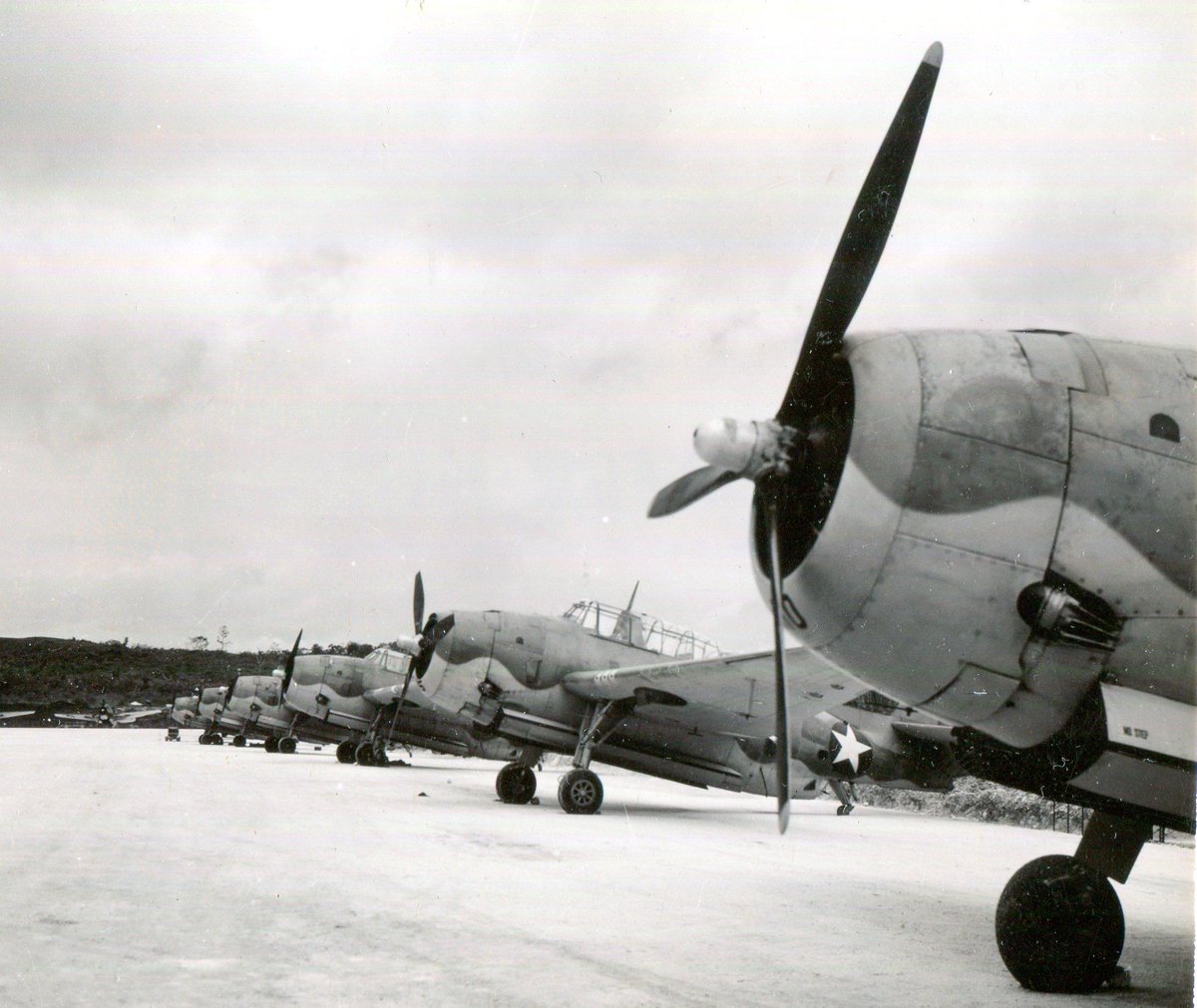 Grumman TBF Avengers on the coral ramp at Munda airfield in New Georgia, Solomon Islands, in 1943. #History #WWII